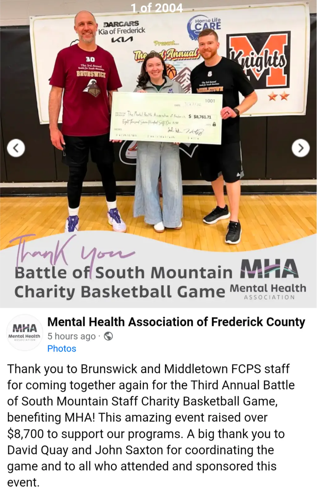 Hoops4Hope organizers presenting an $8,761.71 check to the Mental Health Association after the 2026 game.